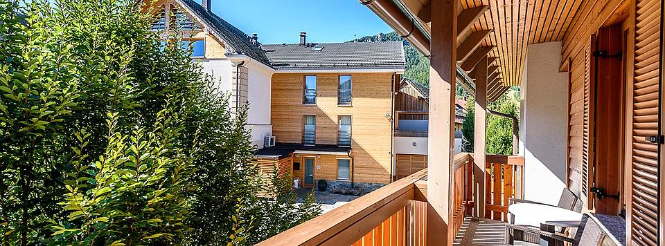 csm_Holzbalkon_Vordach_GI-611772490_header_433b9b5340.jpg
